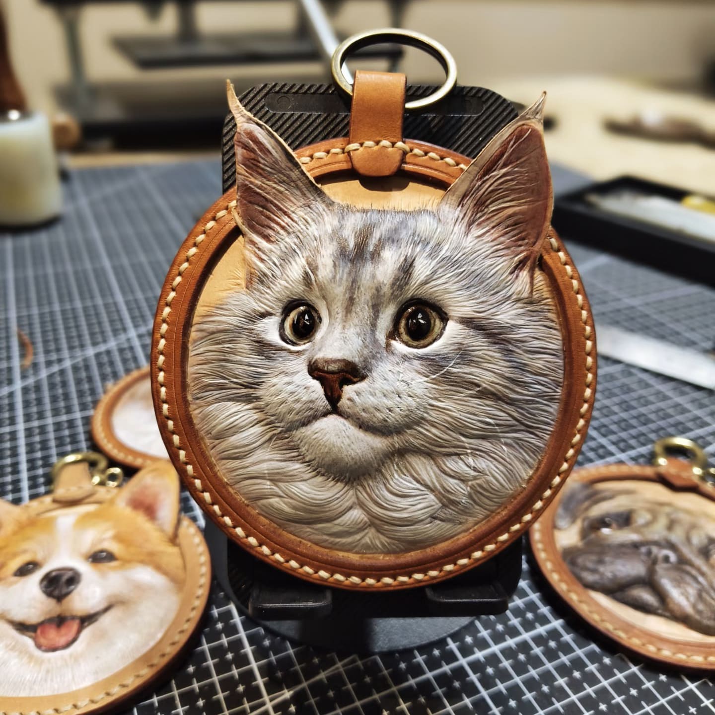 Round handcrafted custom pet leather carving